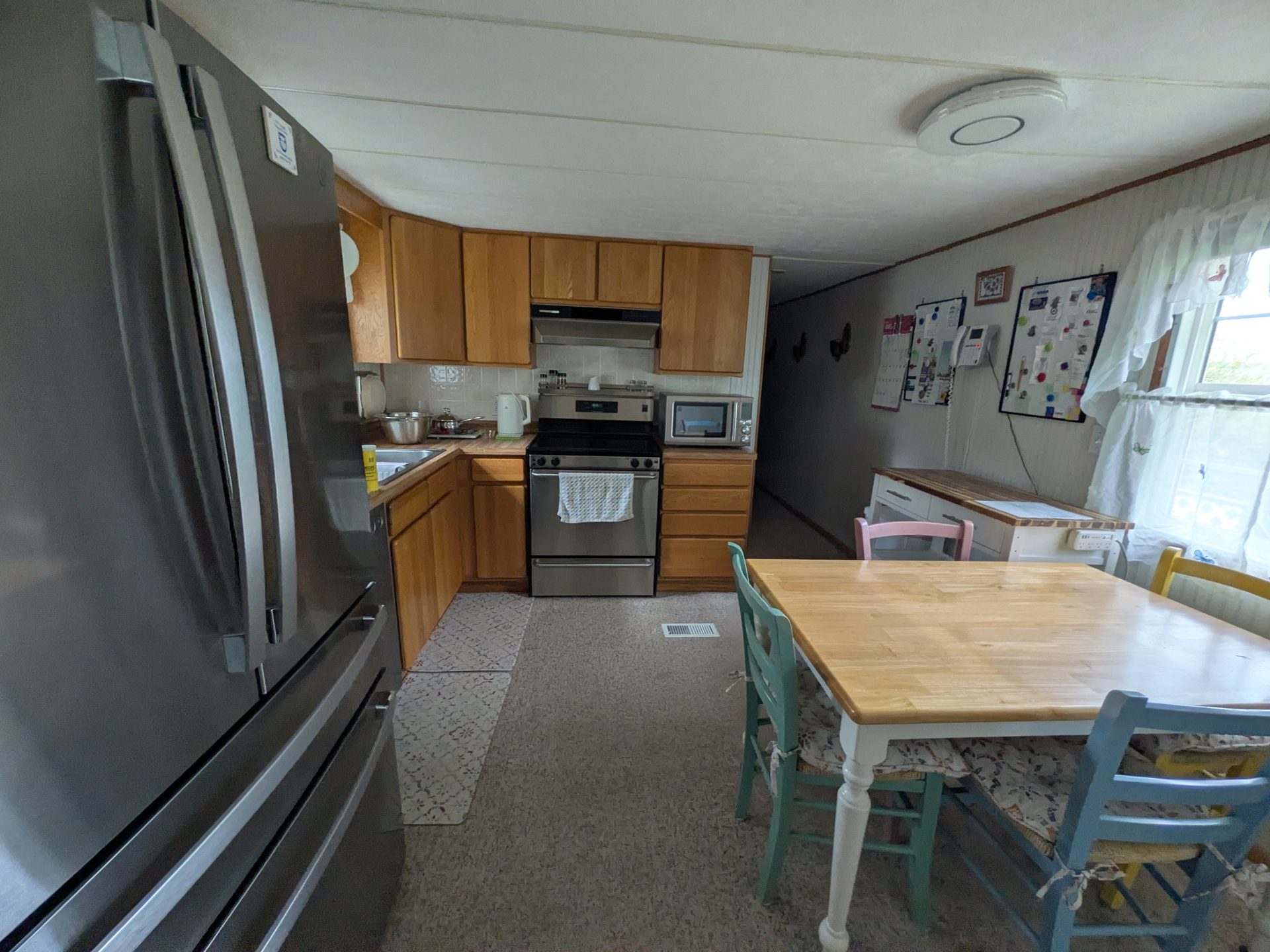 Eat-in kitchen with stainless appliances